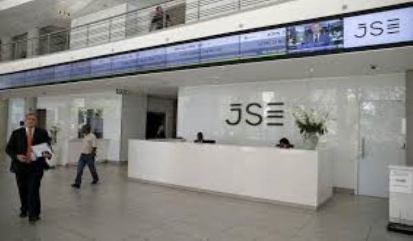 People walk near the reception at the Johannesburg Stock Exchange (JSE) in Sandton