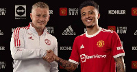 Jadon Sancho (kulia) akiwa na Ole Gunner Solkjaer