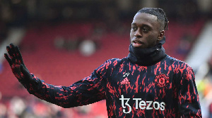 Aaron Wan Bissaka Waving At A Manchester United Match