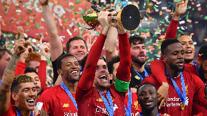 Liverpool Captain Jordan Henderson Lifts The Fifa Club World Cup