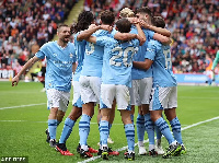 Wachezaji wa Man City wakishangilia ushindi dhidi ya sheffield