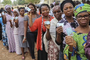 NIgerian Voters Display Their PVCs Prior To Voting Election 897x598 1