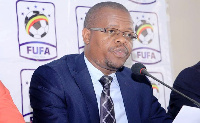 Rais wa Shirikisho la Soka Nchini Uganda (FUFA) Moses Magogo